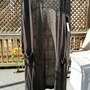 FREE PEOPLE LONG SWEATER. SIZE LARGE